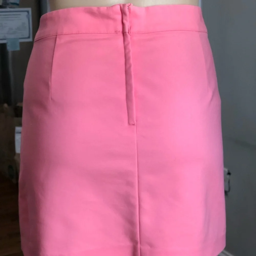 H&M coral mini skirt with front pockets
